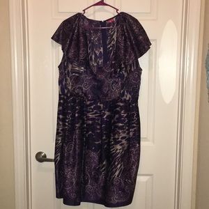 Lovely pattern purple dress with pockets.